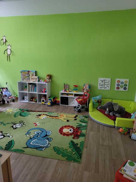 Spielzimmer mit kleiner Kuschelecke